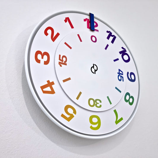 FIRST Medium White/RndBlue/Rainbow Wall Clock