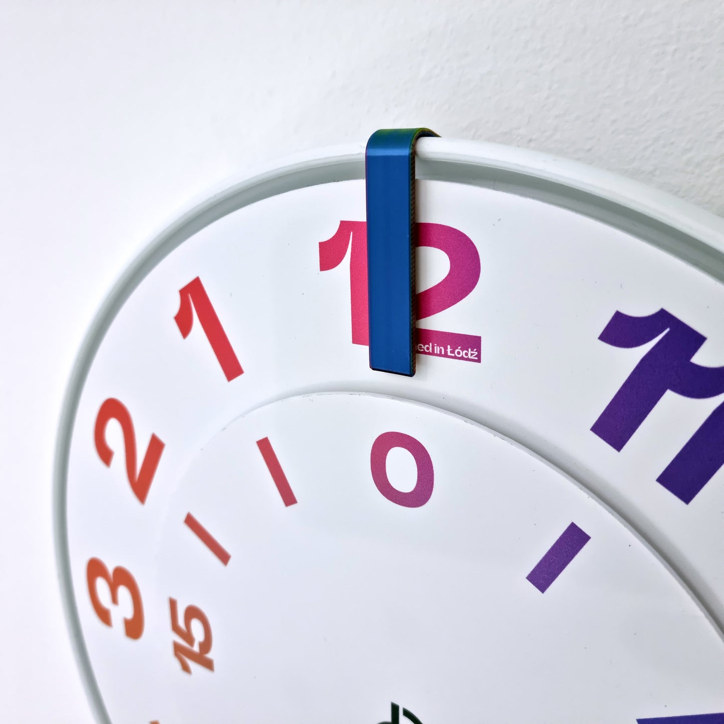 FIRST Medium White/RndBlue/Rainbow Wall Clock