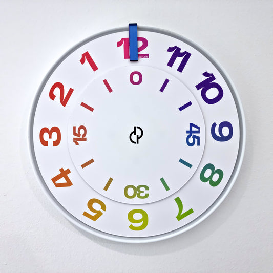 FIRST Medium White/RndBlue/Rainbow Wall Clock